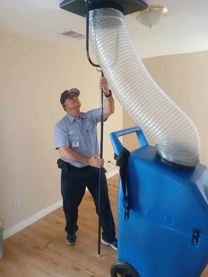 HVAC Installation technician using HEPA equipment in Welcome